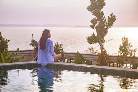 2 outdoor pools, open 7:00 AM to 9:00 PM, pool umbrellas, sun loungers