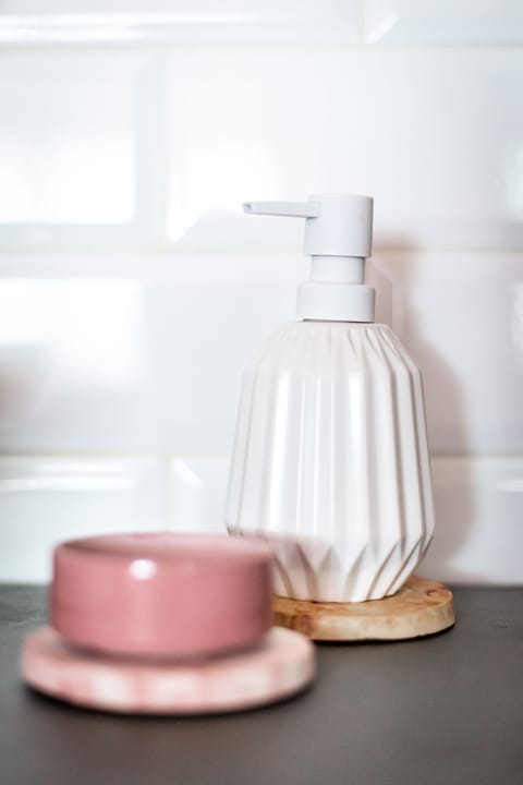 Design Room | Bathroom | Shower, rainfall showerhead, designer toiletries, hair dryer