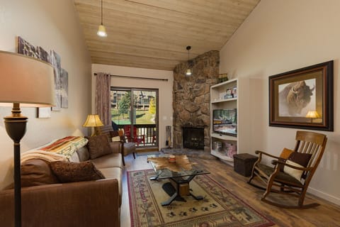 Living Area with Fireplace and Balcony