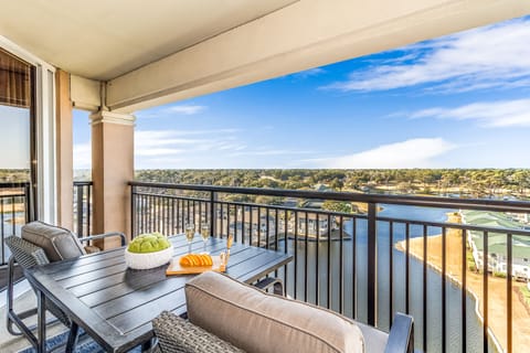 Unwind on your private balcony with sweeping water views, where comfortable seating invites you to savor morning coffee or evening cocktails.