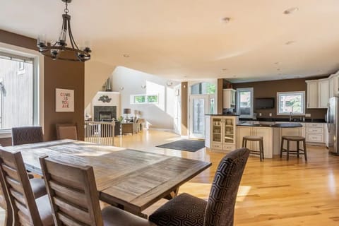Dining room looking to kitchen and main floor living room.