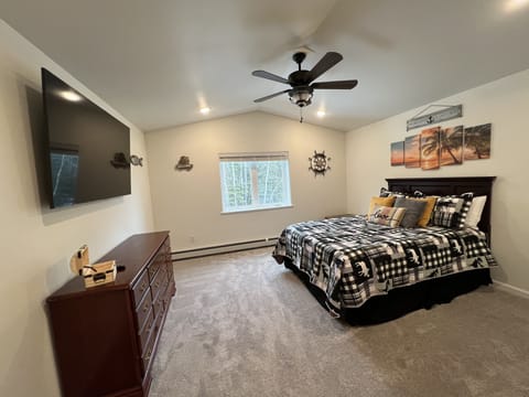 Master bedroom with master bath and 65” TV (upstairs)