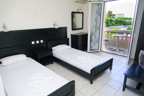 Iron/ironing board, travel crib, free WiFi, bed sheets