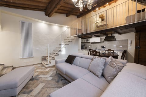 Deluxe Apartment | Living area | 40-inch flat-screen TV with digital channels, TV