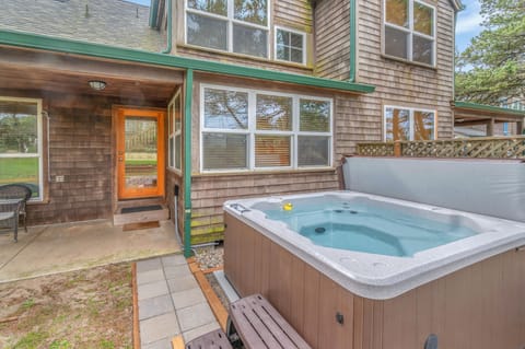 Soak your worries away in your private hot tub, perfectly positioned for relaxation after exploring the beautiful surroundings.