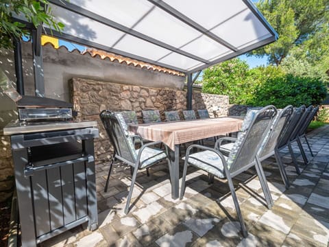 Furniture, Plant, Property, Table, Chair, Wood, Shade, Outdoor Furniture, Tree, Interior Design