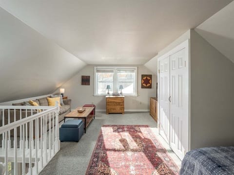 Sleeping loft with sofa bed and king bed