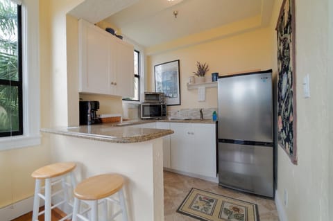 Large, fully stocked kitchenette.  Microwave, Toaster oven, 2 seater bar counter
