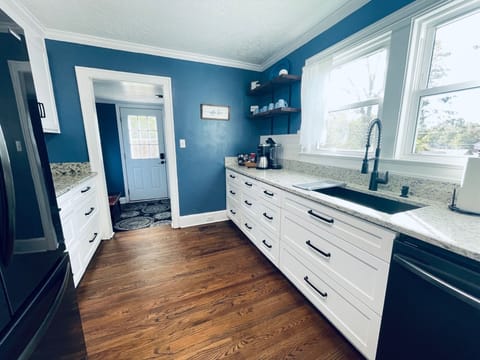 Fully stocked with coffee bar area, front door frig, stove with air fryer.