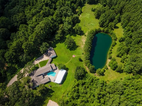 Property located on 24 acres of serenity and Nature minutes from The Woodlands .