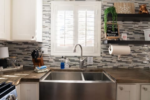 Cozy, inviting sink area with natural light