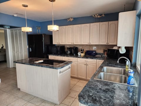 Fully appointed kitchen with stovetop, enjoy dinner in!