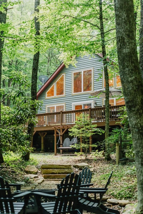 View of the back of the house from gravel fire pit