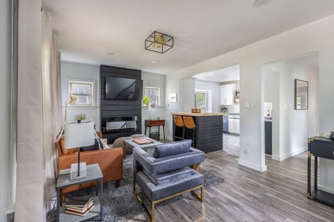 Open concept living room flows with ease into the kitchen so everyone gets to visit.