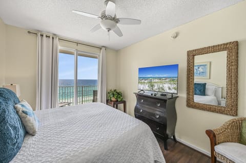 The master bedroom is bright and beachy with a King bed with new mattress, Smart TV, large closet, and bathroom with dual vanity with shower/tub combo + GULF VIEWS!