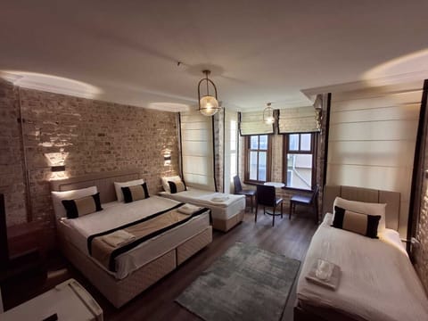 Comfort Quadruple Room | Premium bedding, Select Comfort beds, in-room safe, desk