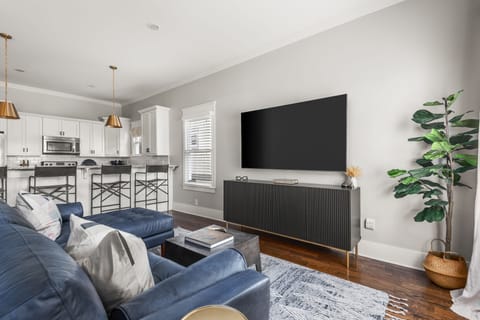 Spacious Living room with 75' smart TV