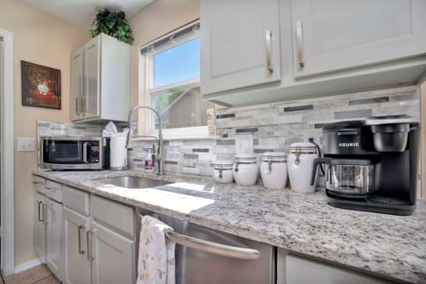 Effortlessly prepare meals in your bright, amenity-rich kitchen.