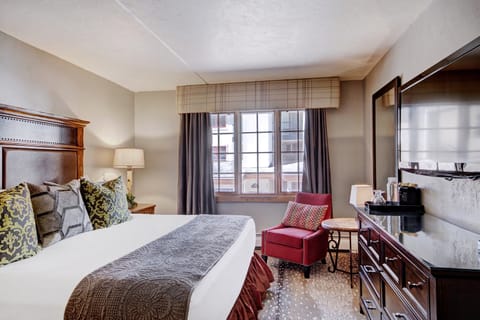 Sit back and enjoy watching a movie on the flat screen TV.