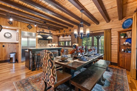 Bench Seating with King and Queen Chairs at the Dining Table