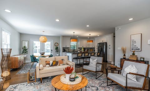 Beautiful new open floor plan! The family room has a couch, love seat & 2 chairs