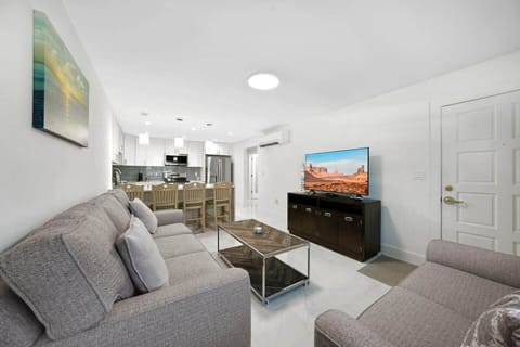 Spacious living room right across the dining area and kitchen. 