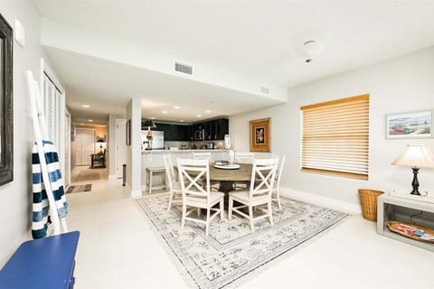 Alternate view of the dining room and kitchen
