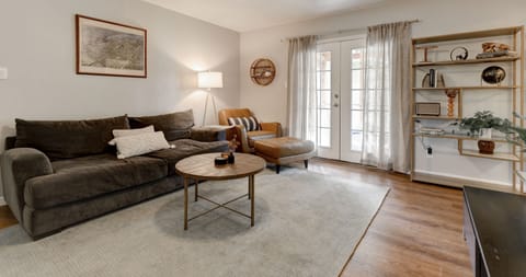 Open living area with smart TV, Google fiber WiFi, Bluetooth speaker, and games.