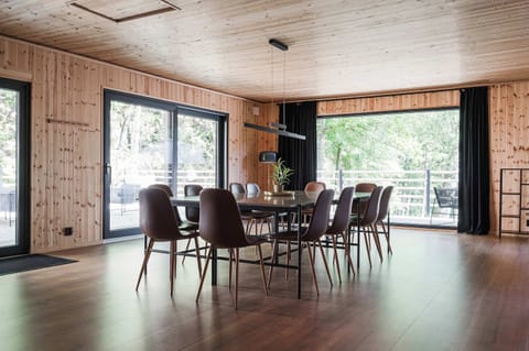 Dining area for 18 sits on a long table.