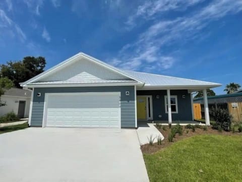 Front of the house.   Driveway parking for up to 4 cars.