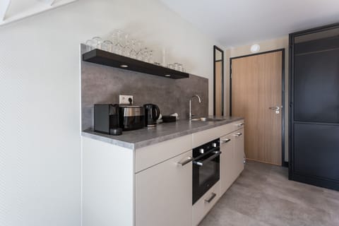 Superior Loft (Max. 1 dog allowed on Request) | Private kitchen | Coffee/tea maker, electric kettle