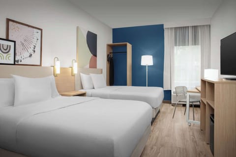 Premium bedding, down comforters, desk, laptop workspace