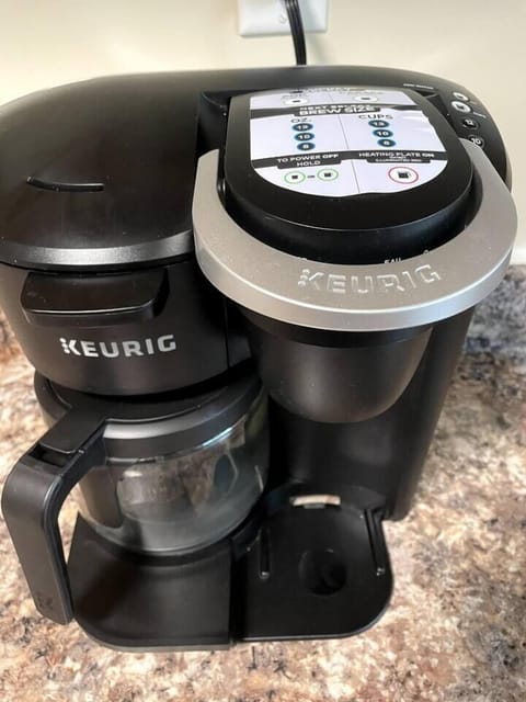 Keurig waiting to brew you a fresh cup -- OR use the drip side to make an entire pot of coffee if you prefer.