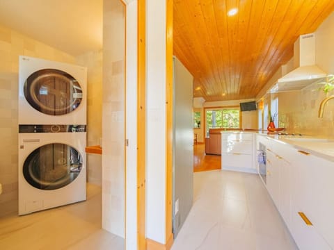 Washing machine and dryer in suite.
