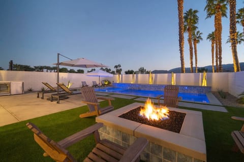 Backyard firepit glowing at night, perfect for gathering under the stars