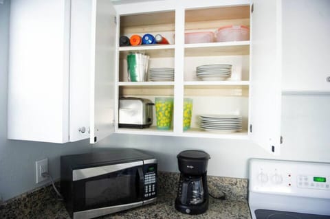 Unit 1- All of your cooking utensils, plates, bowls, wine glasses, pots, drip coffee maker (and coffee) and of course a blender,  are provided for you.