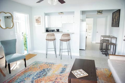 Unit 1-Drink your morning coffee or grab a snack at the bar.  Even better- drink your morning coffee on the back porch while you watch the dolphins swim!