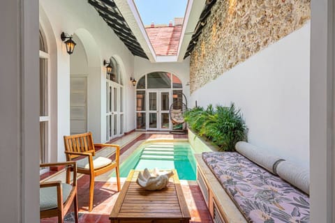Private pool · Sun-drenched colonial courtyard · Open 24h