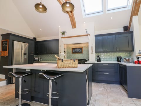 Fridge, dishwasher, electric kettle, cookware/dishes/utensils