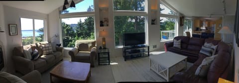 Living room with territorial view of Puget Sound, Olympic mountains and Marina