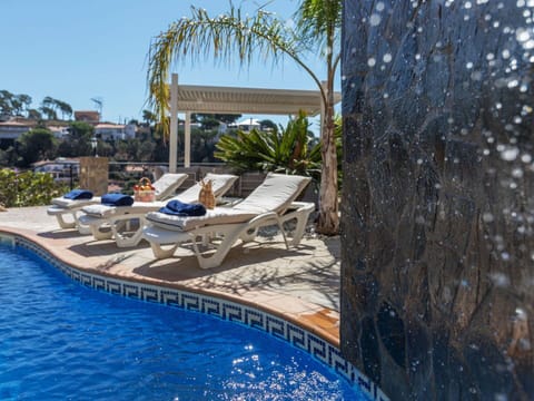Water, Sky, Swimming Pool, Seaside Resort, Plant, Building, Azure, Tree, Outdoor Furniture, Sunlounger