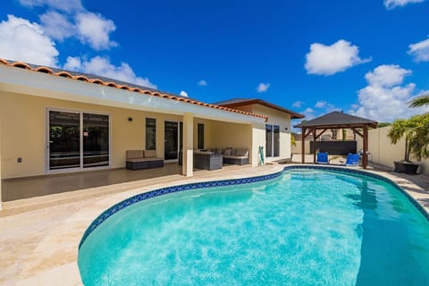 This house provides plenty of outdoor space for you to relax and enjoy the beautiful pool during your stay.