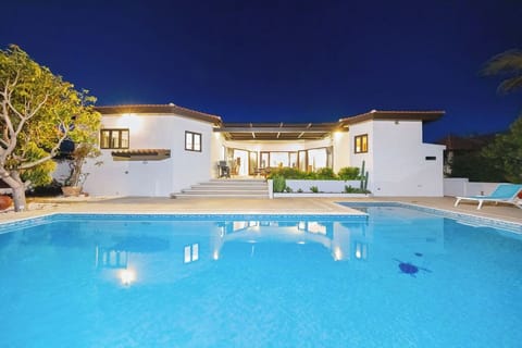 Experience the ultimate in relaxation in our stunning private pool area after sunset. The night sky is a canvas of twinkling stars as you lounge on plush sun loungers, perfectly situated for moonlit views