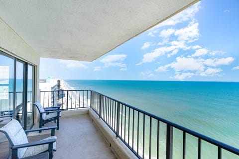 Relax on your private oceanfront balcony with cushioned seating as you soak in endless sea views and gentle coastal breezes.