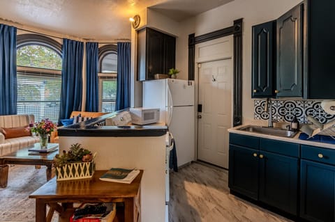 Charming full kitchen with lots of amenities