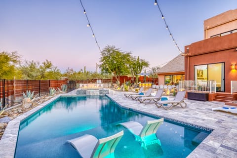 Desert Star has the perfect resort-style backyard with a heated pool & hot tub!