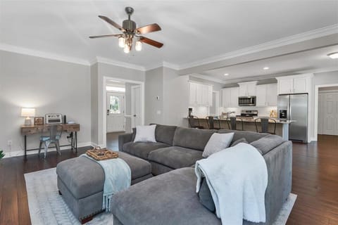 Living room with smart TV and workspace