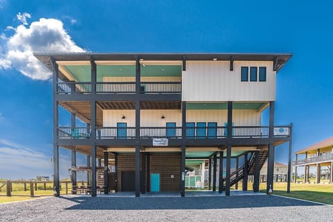 Street side view, beach to the left.