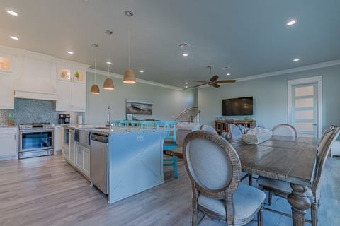 Open concept kitchen, dining, and living