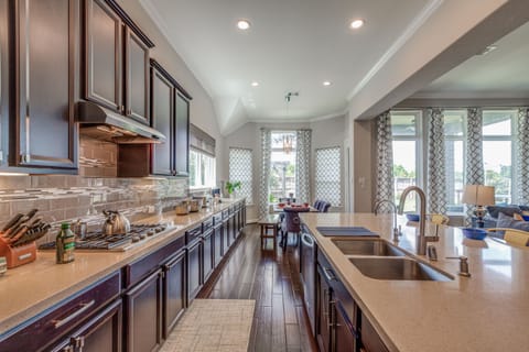 Our lovely kitchen includes all stainless steel appliances, pots, pans, etc. 